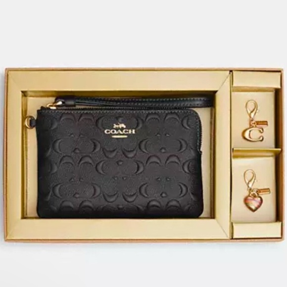 Coach Handbags - Coach NIB Black Wristlet and 2 Charms Box Set.